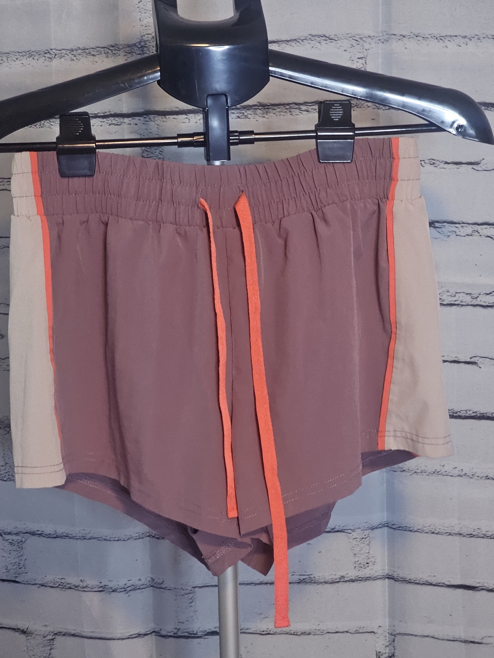 Fabletics Mauve Athletic Shorts with Orange Trim and Beige Panels